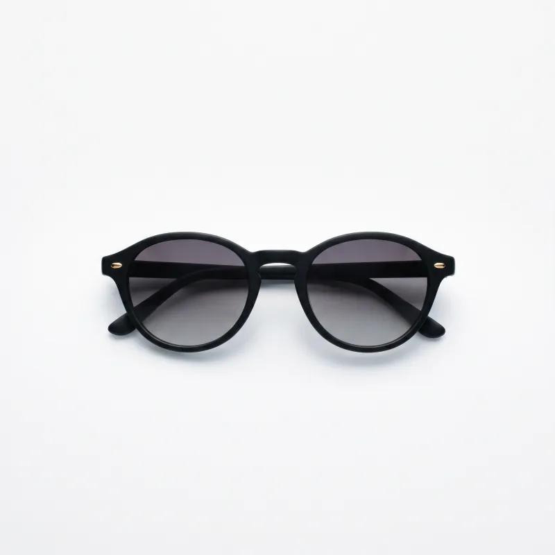 Minimalist e-commerce hero photograph of the same matte black sunglasses on a seamless pure white infinity backdrop with restrained cool shadow, single soft top-key light, sharp clean look, Playcut generation